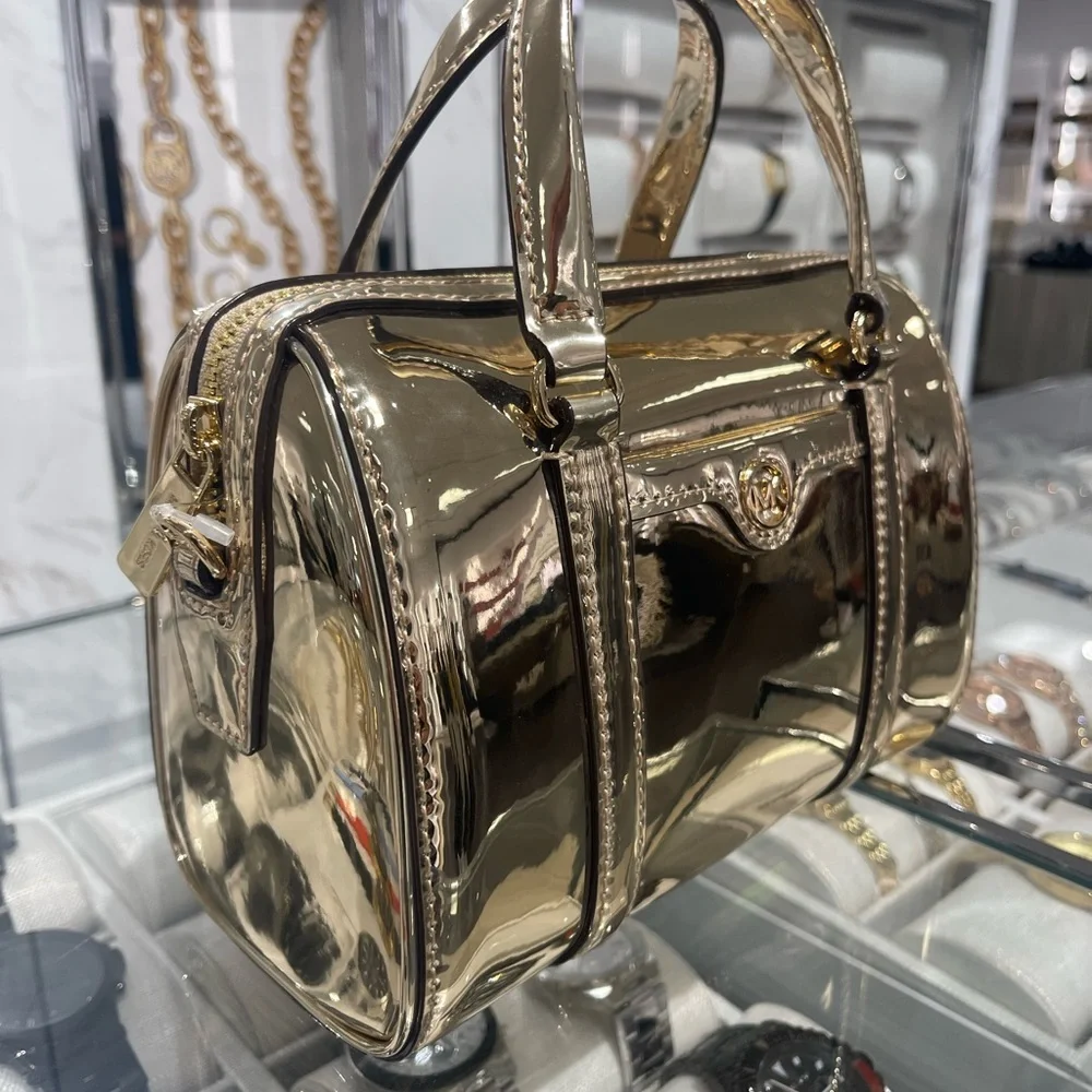 MICHAEL KORS Jet Set Small Metallic Convertible Crossbody Duffle Xbody
Pale Gold - Picture 14 of 16